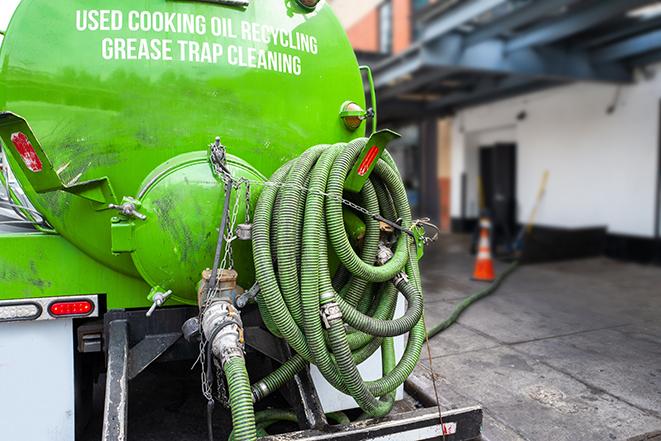 pump truck removing waste from a grease trap in Agoura Hills CA